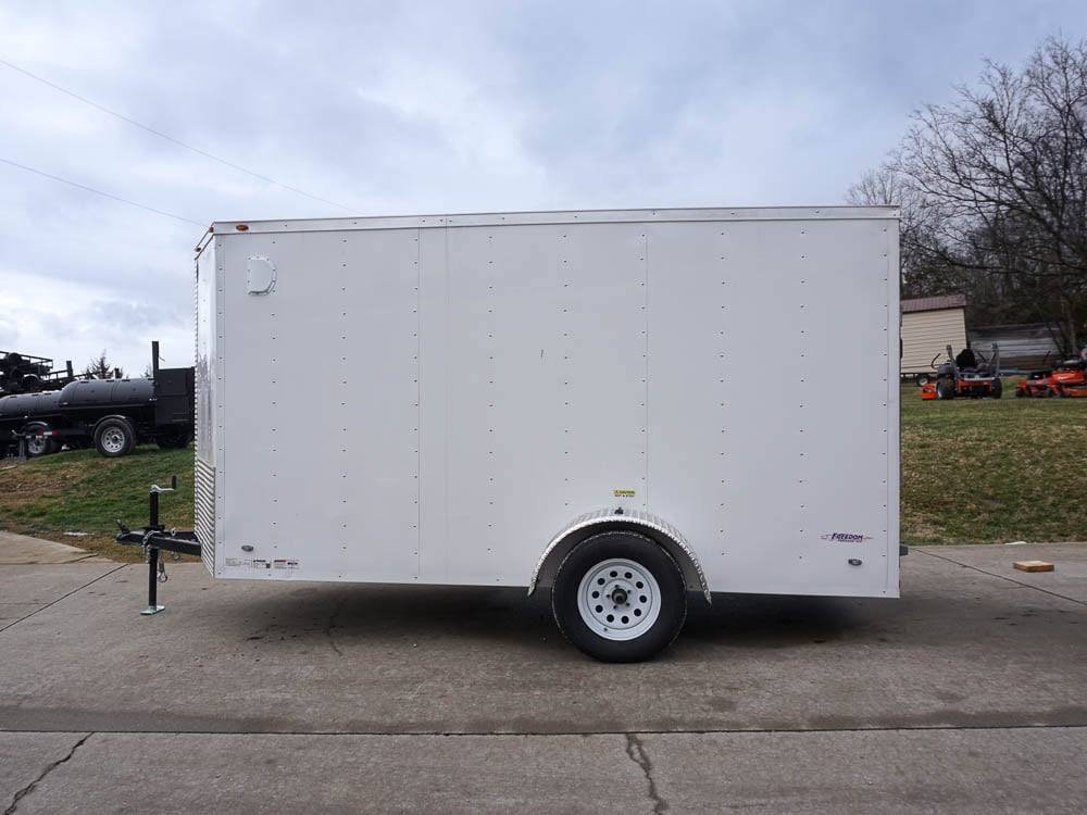 6' X 12' White Enclosed V-Nose Trailer with Diamond Plate Floor Storage image 9