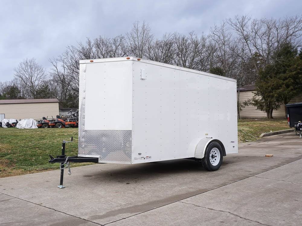 6' X 12' White Enclosed V-Nose Trailer with Diamond Plate Floor Storage image 0