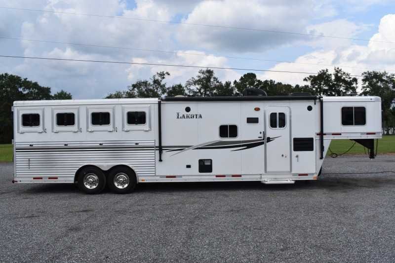 2013 Lakota Charger 8411LQ 4 Horse Trailer with 13′ Short Wall image 1