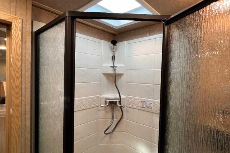 2024 Lakota Charger 8411RKGLQ 4 Horse Trailer with 11′ Short Wall image 11