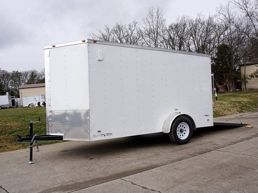 6' X 12' White Enclosed V-Nose Trailer with Diamond Plate Floor Storage image 2